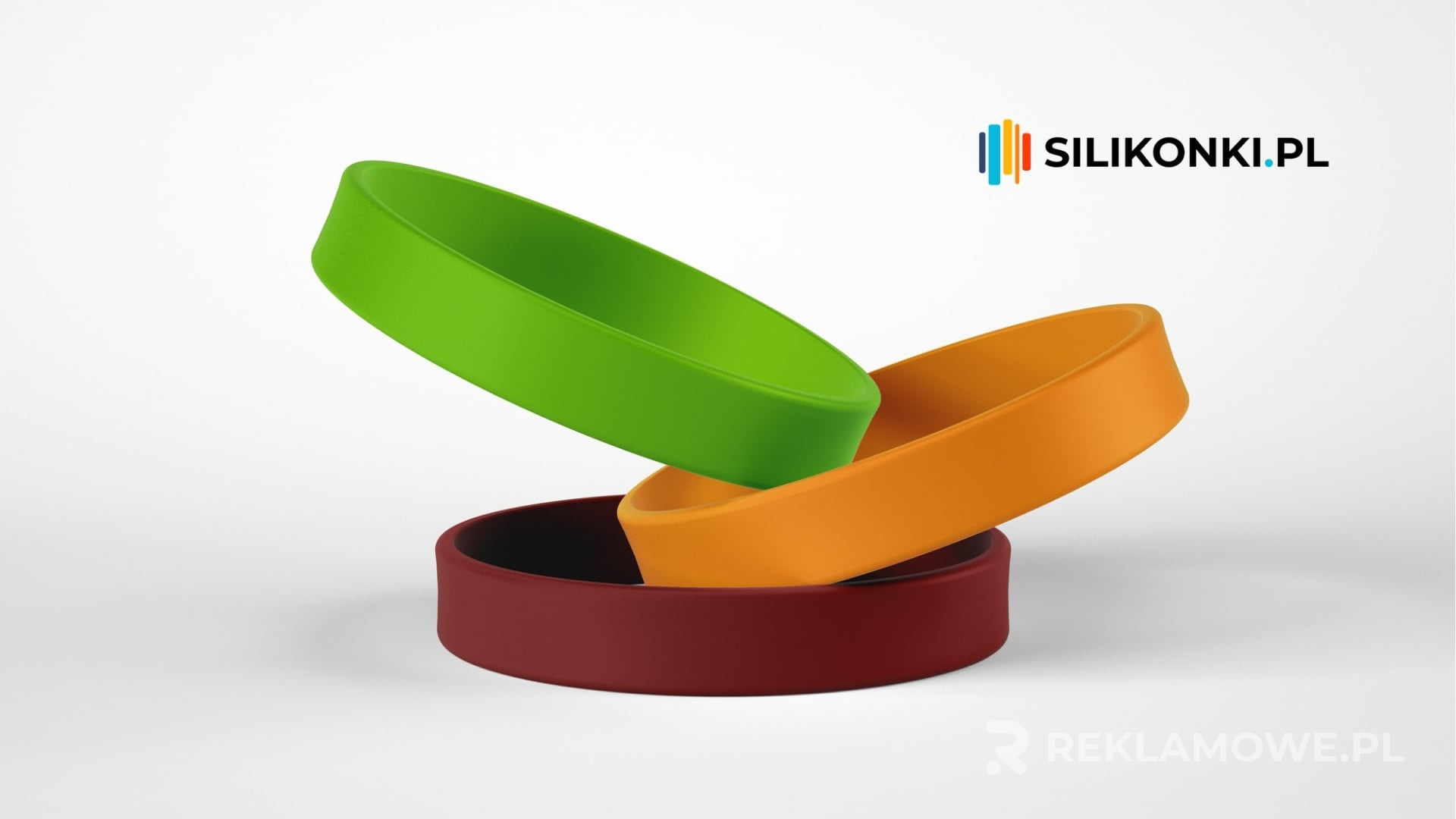 Kolorowe opaski reklamowe na rękach osób